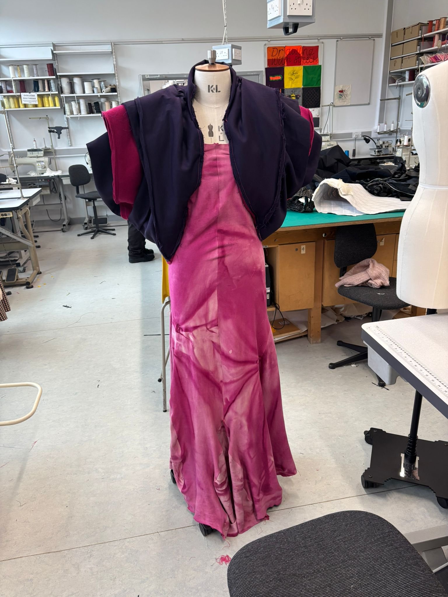 Pink ruffled dress - front view on mannequin