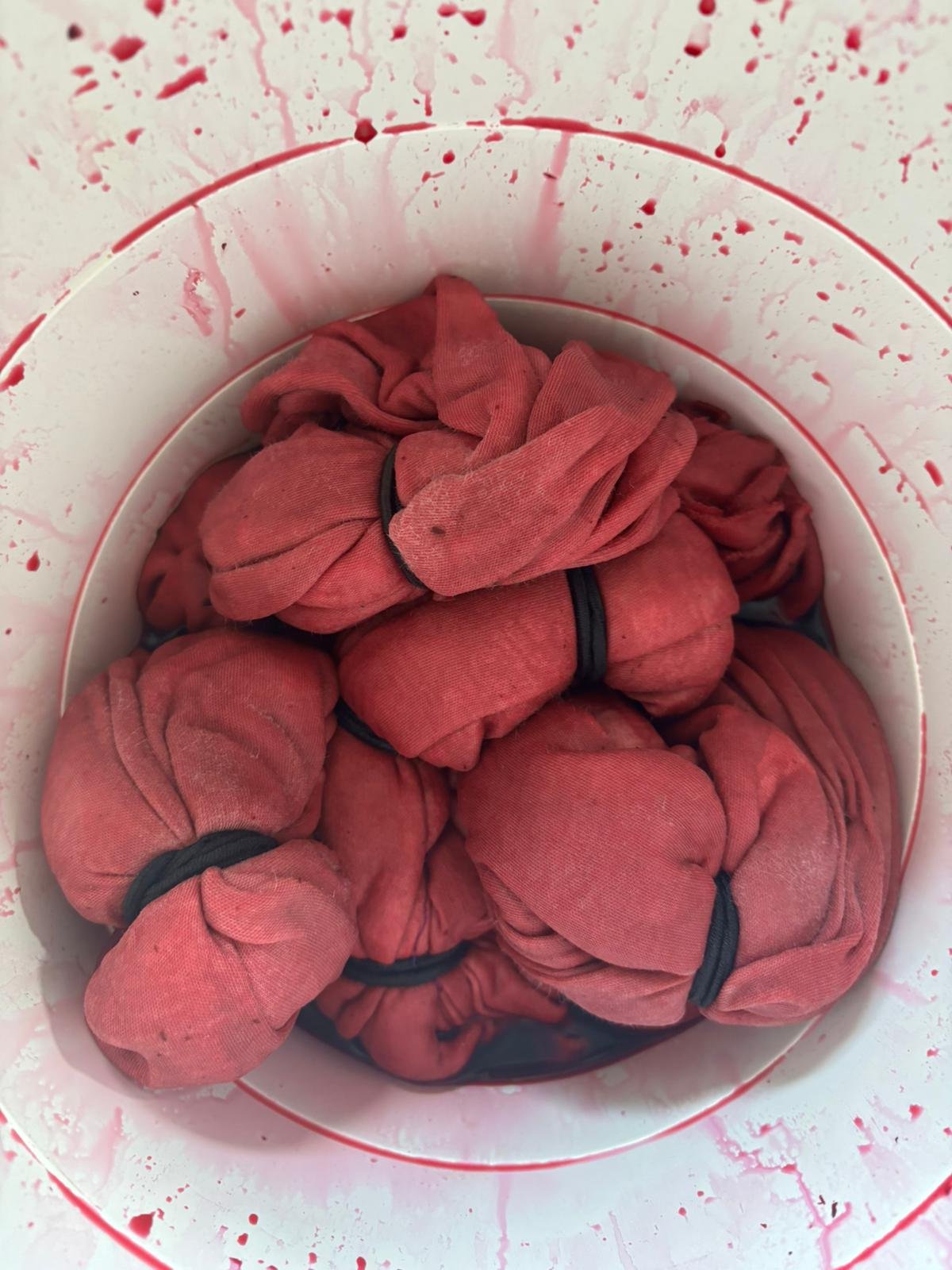 Beetroot-dyed fabric showing deep pink/red color achieved